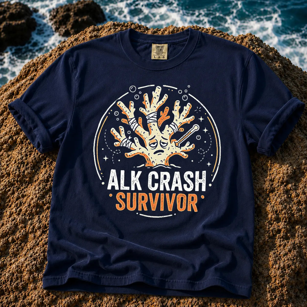 Broke Reefers saltwater aquarium graphic t-shirt featuring an expressive, bandaged coral illustration with the text: ALK CRASH SURVIVOR, navy crew neck tee