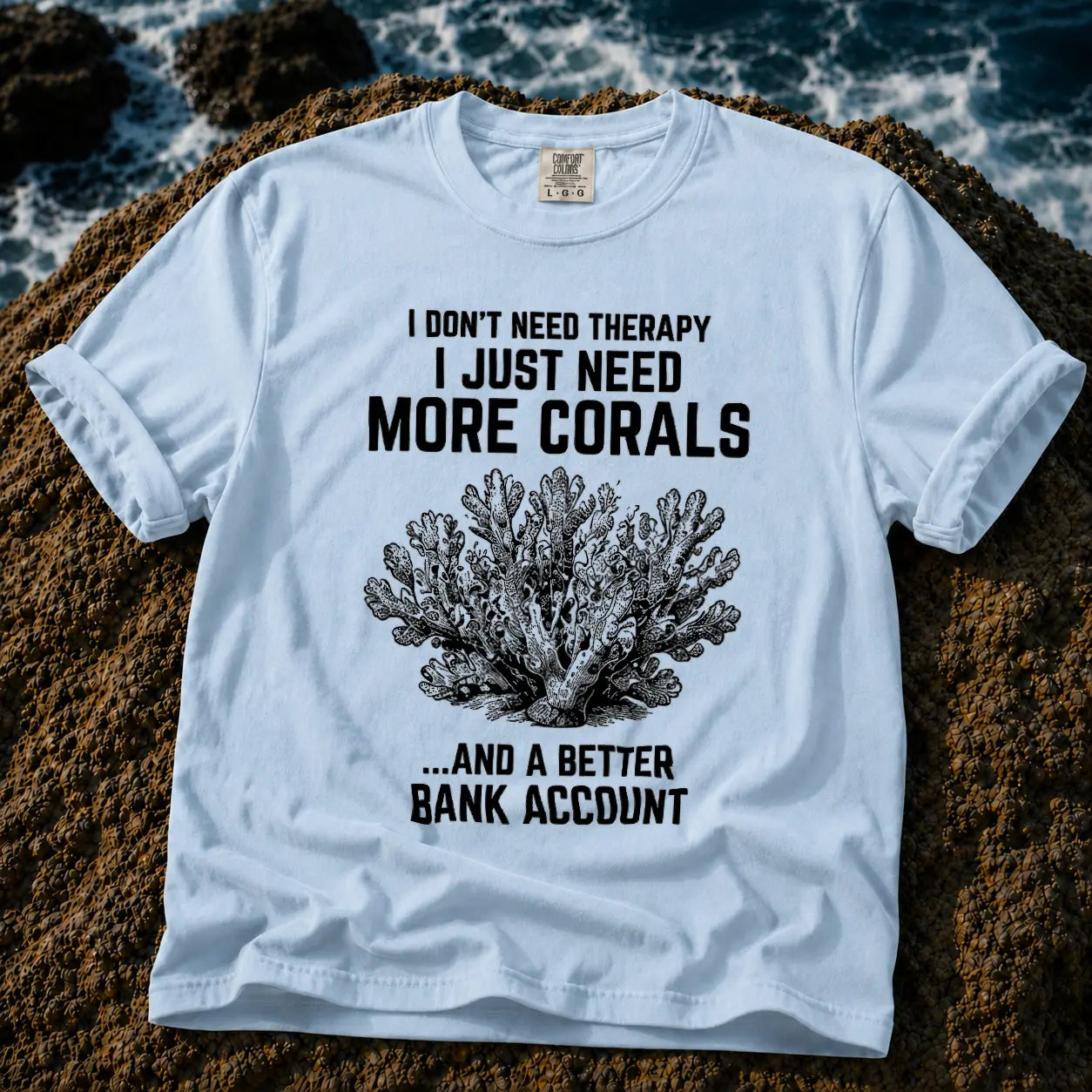 Broke Reefers saltwater aquarium graphic t-shirt featuring a detailed vintage-style coral illustration with the text: I DON'T NEED THERAPY, I JUST NEED MORE CORALS, ...AND A BETTER BANK ACCOUNT, light blue crew neck tee