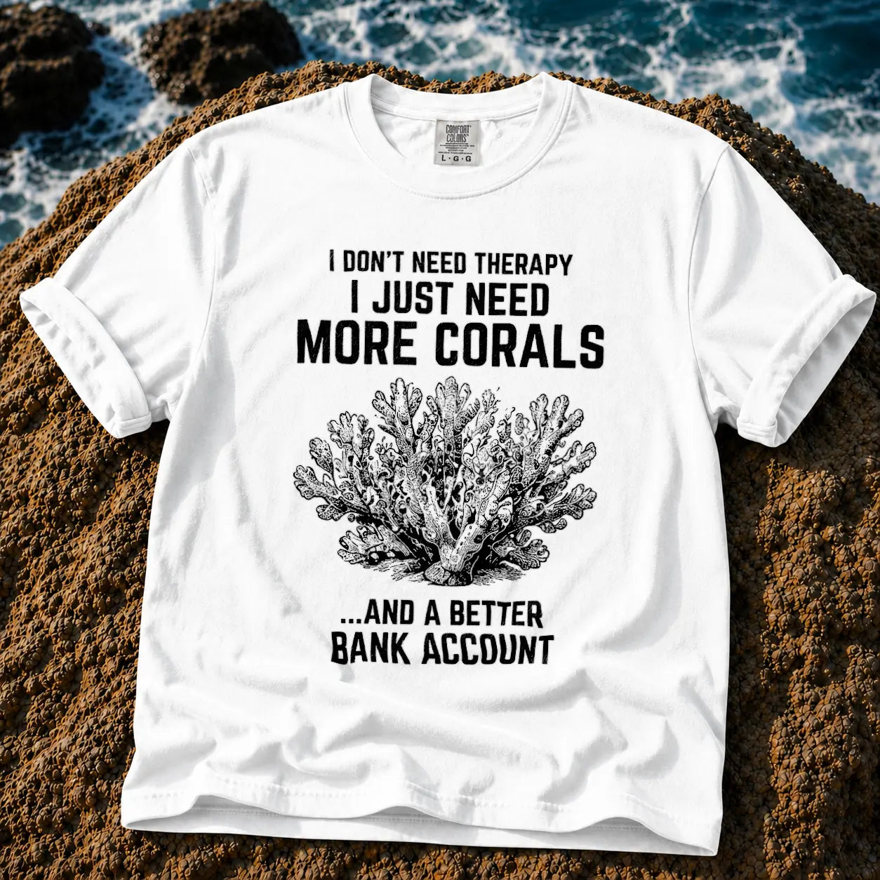 Broke Reefers saltwater aquarium graphic t-shirt featuring a detailed vintage-style coral illustration with the text: I DON'T NEED THERAPY, I JUST NEED MORE CORALS, ...AND A BETTER BANK ACCOUNT, white crew neck tee