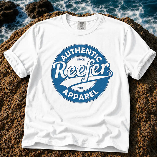 Broke Reefers saltwater aquarium graphic t-shirt featuring a classic circular collegiate emblem with the text: AUTHENTIC REEFER, SINCE 1987, APPAREL, white crew neck tee
